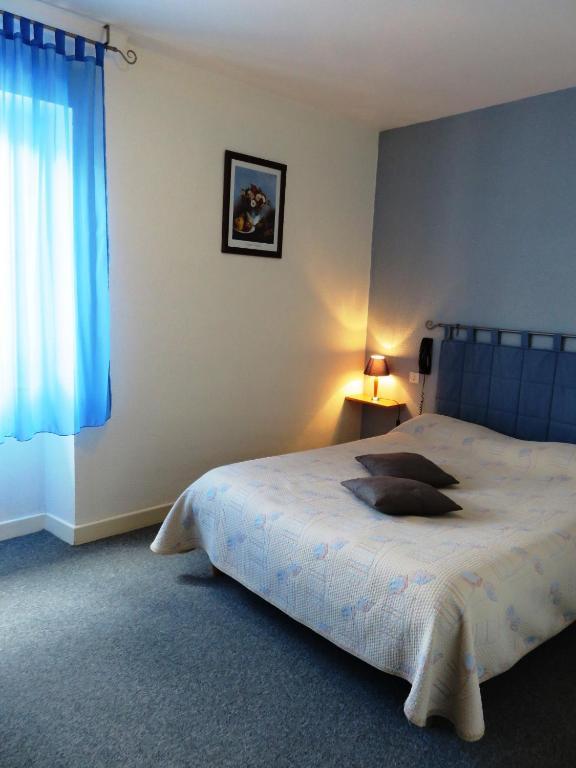 Hôtel Le Relais Du Pont De Rhodes à Frayssinet Chambre photo